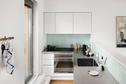 
Majoituspaikan Central Nordic Design Penthouse keittiö tai keittotila
