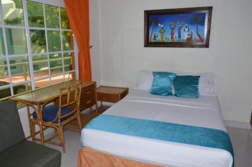 Hospedaje Villa Naloyにあるベッド