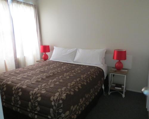 Postel nebo postele na pokoji v ubytování Culverden Court Motel