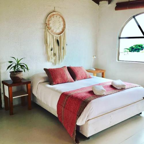 Ein Bett oder Betten in einem Zimmer der Unterkunft Conviento de Lobos