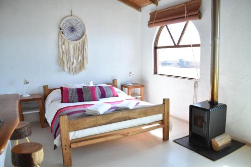 Ein Bett oder Betten in einem Zimmer der Unterkunft Conviento de Lobos