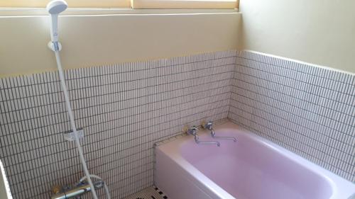 
A bathroom at Guest House Kizuna
