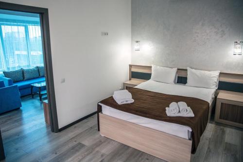 Cama o camas de una habitación en Astra Hotel
