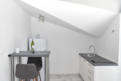 Η κουζίνα ή μικρή κουζίνα στο Apartmani Niko