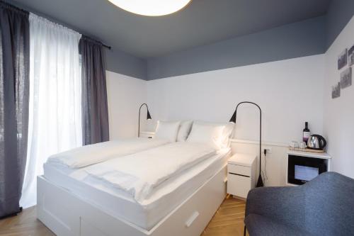 Voodi või voodid majutusasutuse MK Luxury Rooms toas