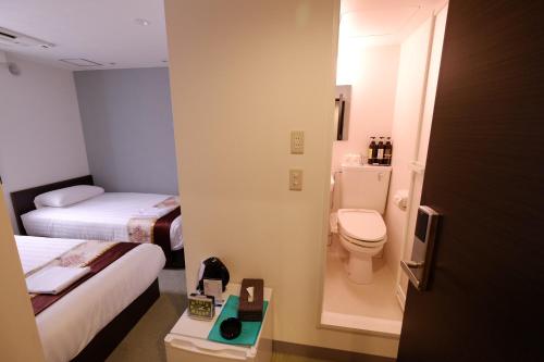 Koupelna v ubytování Tabata Oji Hotel