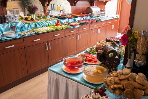 a buffet line with many different plates of food at Viva Deluxe Hotel in Istanbul
