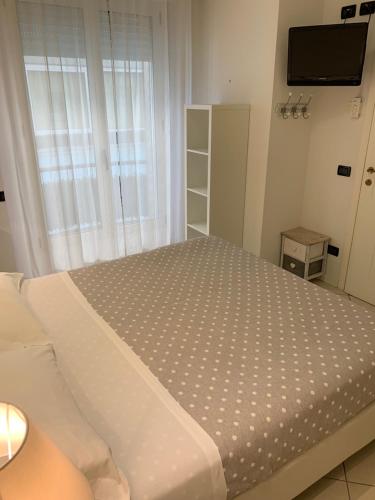 Postel nebo postele na pokoji v ubytování Residence Aida