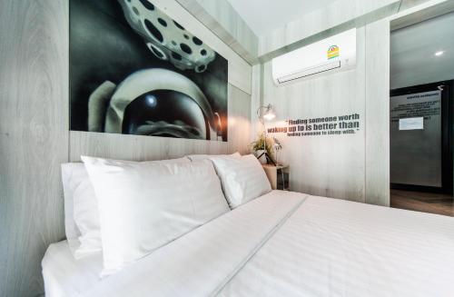 Postel nebo postele na pokoji v ubytování Sleep Walker Poshtel
