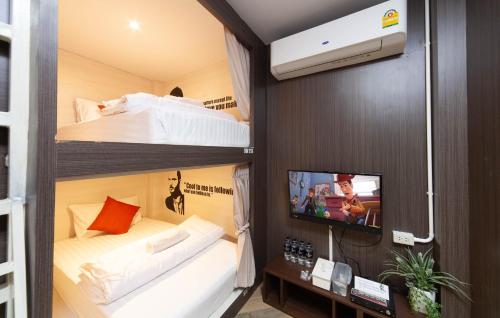 Postel nebo postele na pokoji v ubytování Sleep Walker Poshtel