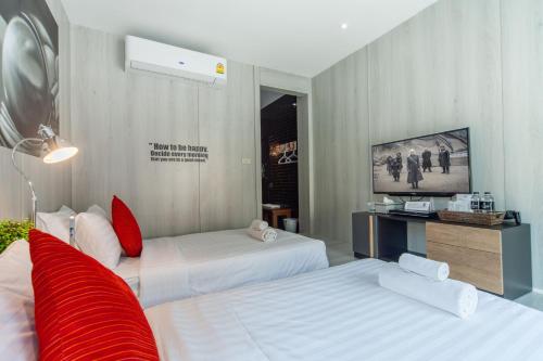 Postel nebo postele na pokoji v ubytování Sleep Walker Poshtel