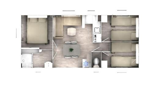 a floor plan of a room with a couch at Camping Victoria in Canet de Mar