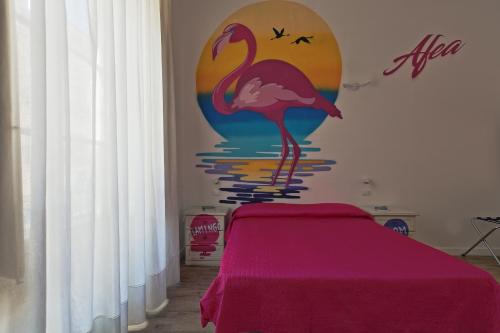 Postel nebo postele na pokoji v ubytování Afea Art & Rooms