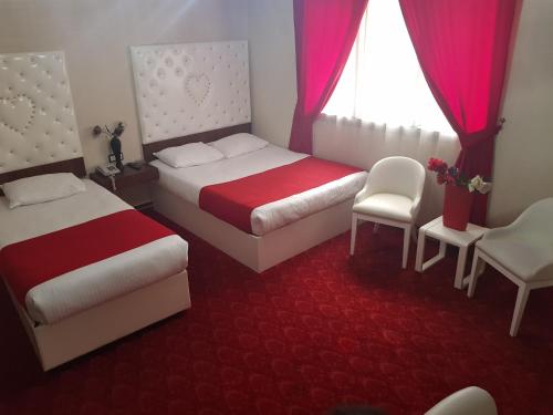 Ένα ή περισσότερα κρεβάτια σε δωμάτιο στο Ismira Hotel Ankara