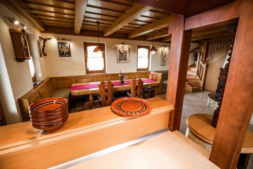 a dining room with a table and chairs at Holiday Home Mirt with HotTub & Sauna in Blanca