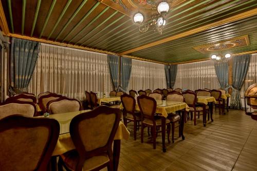 Restoranas ar kita vieta pavalgyti apgyvendinimo įstaigoje Milat Cave Hotel