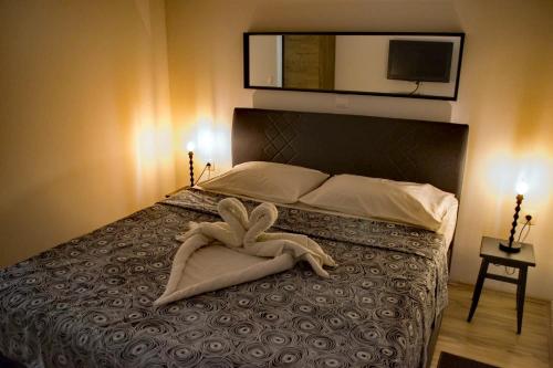 Cama ou camas em um quarto em Apartman Iva
