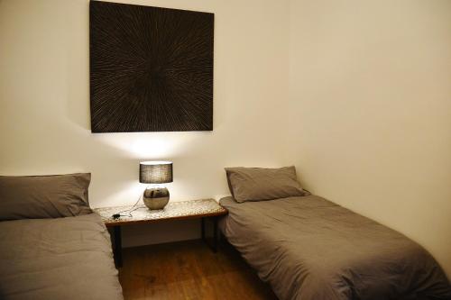 Ένα ή περισσότερα κρεβάτια σε δωμάτιο στο B&B A Casa di Giulia