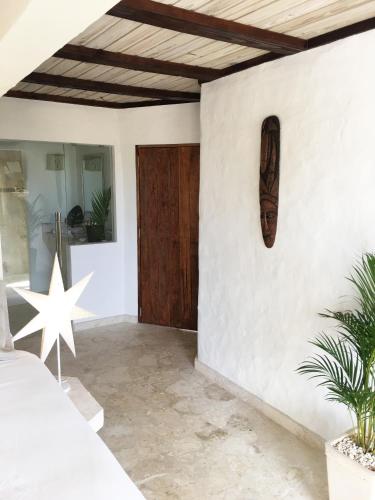 a room with a door and a star on the wall at Cabrera Chalet boutique hotel in Cabrera