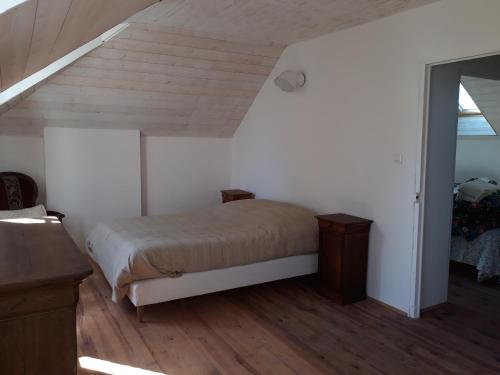 Cama o camas de una habitación en LE PIGEONNIER UTAH BEACH