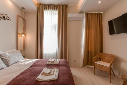 Кровать или кровати в номере Sofia Dream Apartment - Premium One Bedroom on Ekzarh Yosif