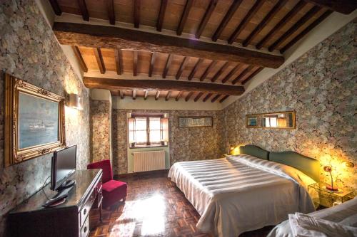 Postel nebo postele na pokoji v ubytování Relais Oroscopo