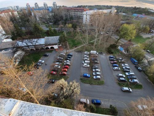 an aerial view of a parking lot with cars at Apartment New Belgrade Home in Belgrade