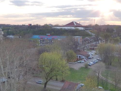 a view of a town with cars parked in a parking lot at Apartment New Belgrade Home in Belgrade