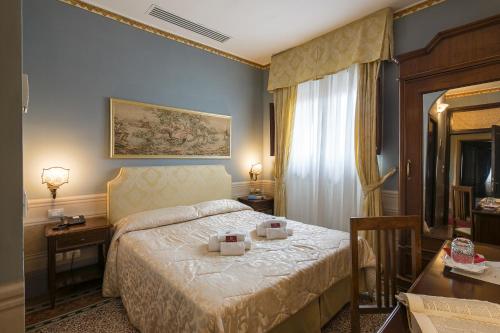 Vuode tai vuoteita majoituspaikassa I Portici Hotel - Residenza D'Epoca