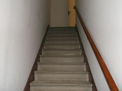 a flight of stairs in a building at centrostoricolipari in Lipari