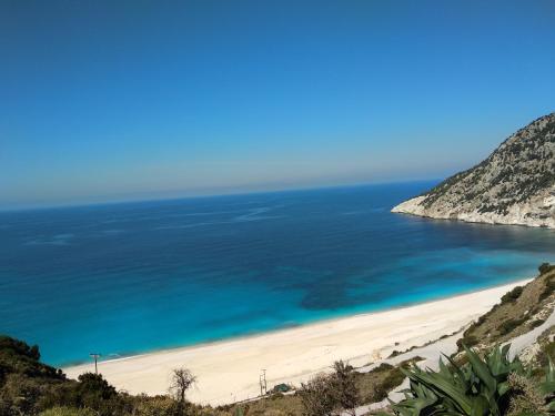 a view of a beach with the ocean at Cephalonian Countryside Villa in Divarata