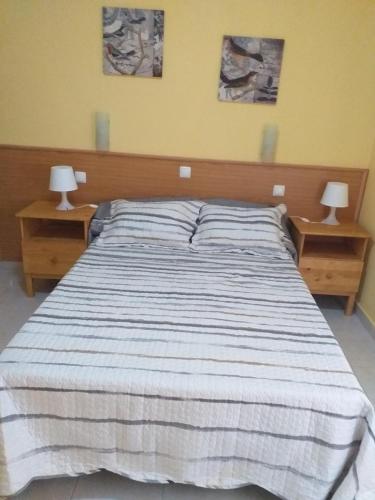 Postel nebo postele na pokoji v ubytování Alojamento Dias