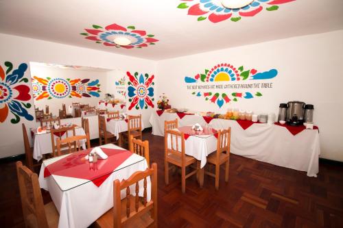 Reštaurácia alebo iné gastronomické zariadenie v ubytovaní Cusco Plaza Nazarenas