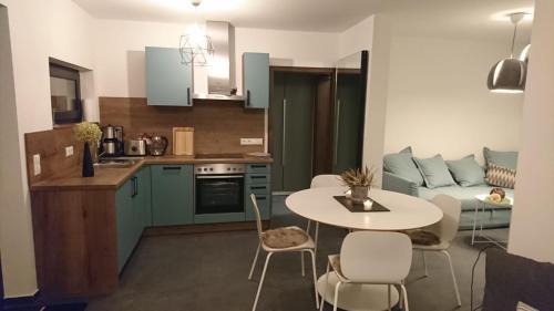 Η κουζίνα ή μικρή κουζίνα στο Ferienhaus sonnenWIND am Hainer See