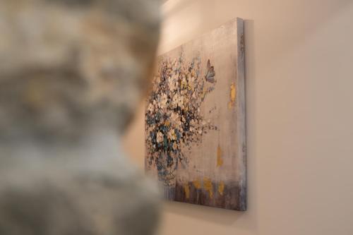a picture of a painting on a wall at Apartments Travel in Otočac