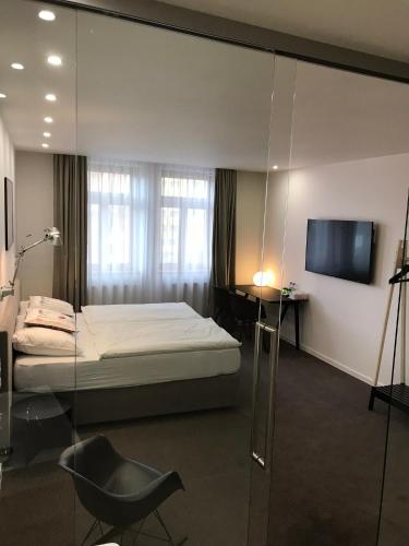 Rozmaryn Hotel B&Bにあるベッド