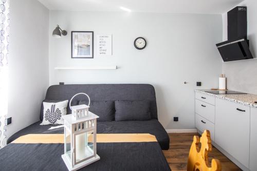 TV a/nebo společenská místnost v ubytování 5 Wierchów Apartamenty
