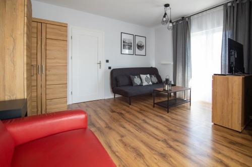 Posezení v ubytování 5 Wierchów Apartamenty