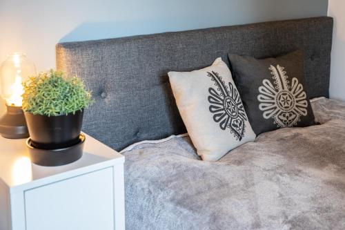 Postel nebo postele na pokoji v ubytování 5 Wierchów Apartamenty
