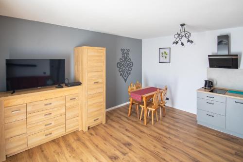 Kuchyň nebo kuchyňský kout v ubytování 5 Wierchów Apartamenty