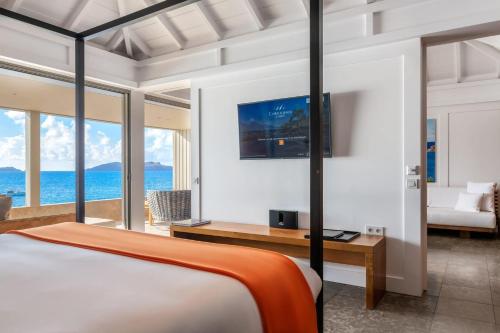Una cama o camas en una habitación de Hotel Christopher Saint Barth