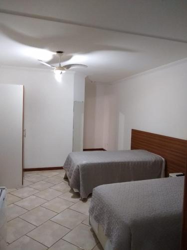 Postel nebo postele na pokoji v ubytování Hotel Di Fratelli