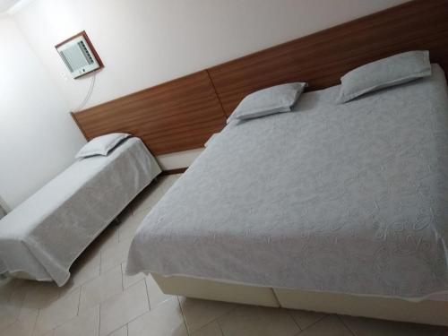 Postel nebo postele na pokoji v ubytování Hotel Di Fratelli