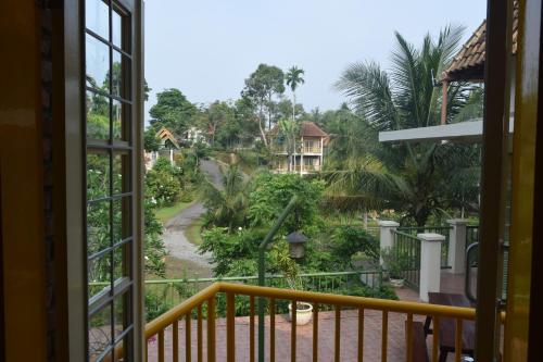 a view from the balcony of a resort at Hotel Deli River and Restaurant Omlandia in Medan