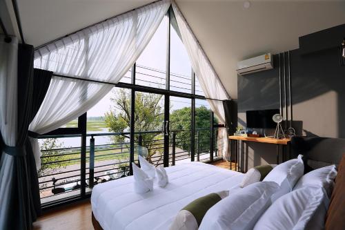 Letto o letti in una camera di Canvas Family Home