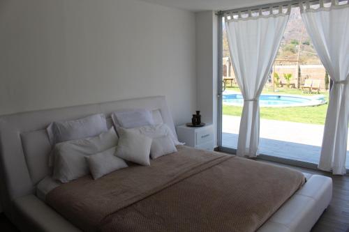 Ένα ή περισσότερα κρεβάτια σε δωμάτιο στο Casa El Camino