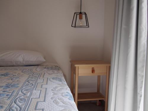 Ένα ή περισσότερα κρεβάτια σε δωμάτιο στο Thalatta Seaside Accommodation