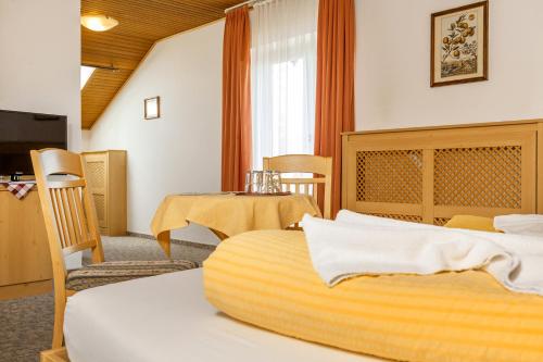Posteľ alebo postele v izbe v ubytovaní Ruperti - Gästehaus