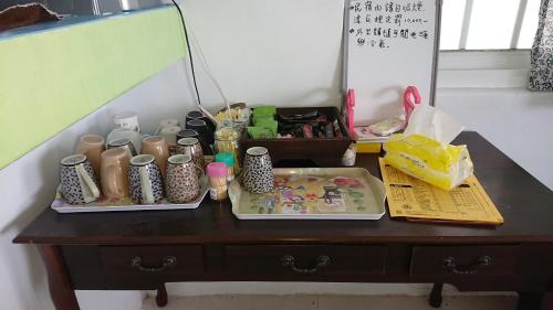 a desk with two trays of items on it at Haven Seaview Homestay in Lanyu