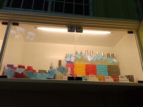a display window of a store with colorful sticky notes at A.C. Asistin Transient House in Baguio